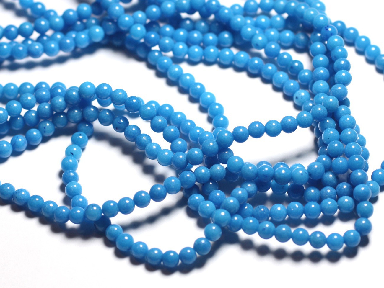 Fil 39cm 92pc env - Perles de Pierre - Jade Boules 4mm Bleu Azur -  4558550039644 