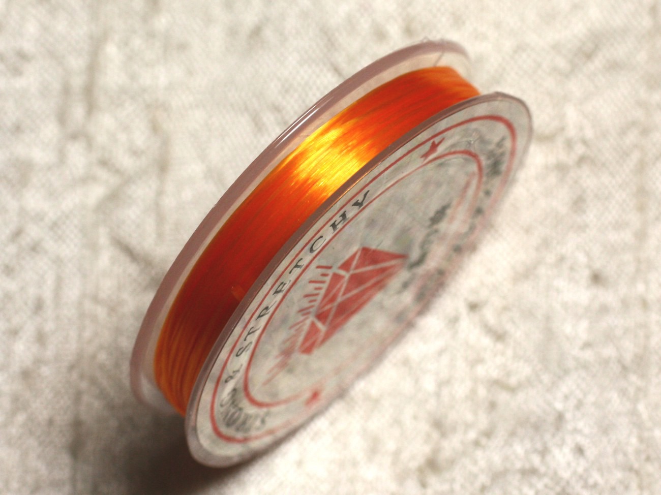 Bobine 10m - Fil Elastique Fibre 0.8-1mm Orange clair  4558550014085 