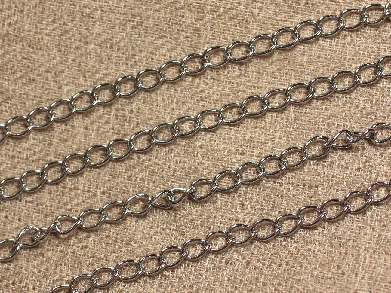 Chaîne Acier 304L - Ovales Torsadés 6x4x0.8mm - 1m   4558550006691