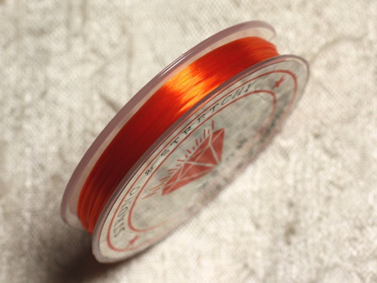 Bobine 10m - Fil Elastique Fibre 0.8-1mm Orange  4558550014092