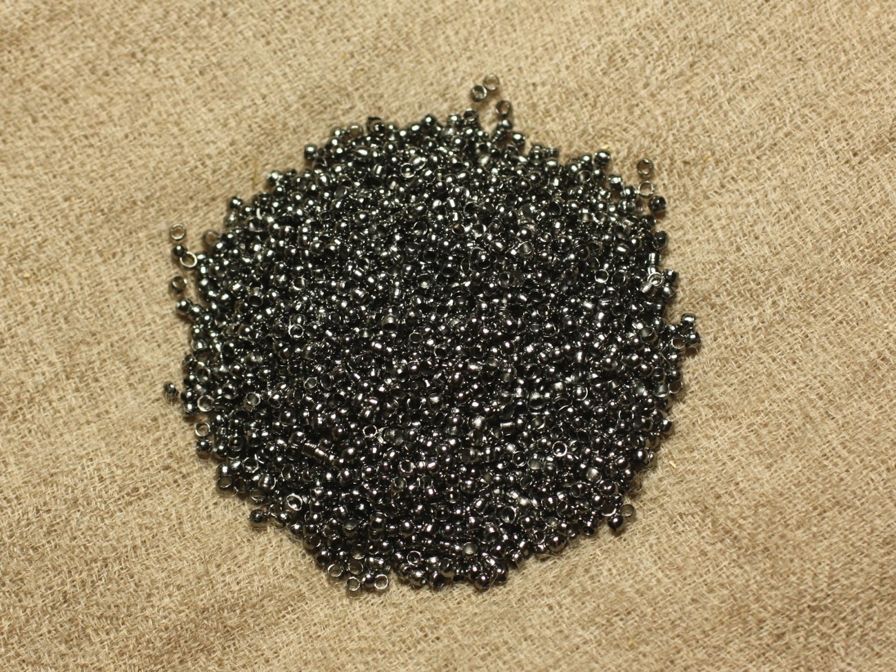 Sachet 1000pc environ - Perles à écraser Métal Noir Qualité 2x1.2mm   4558550025449