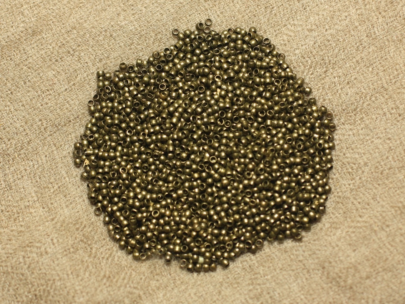 Sachet 1000pc environ - Perles à écraser Métal Bronze Qualité 2x1.2mm   4558550025593