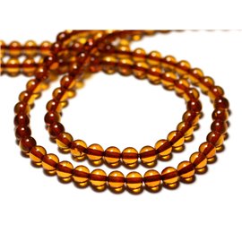 Rijg 40cm ongeveer 80st - Natuurlijke amber Cognac oranje parels 5 mm ballen 