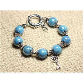 Bracelet Céramique 12mm Couleur au choix - Breloque Clef et fermoir bouée - argenté et bleu turquoise Bracelet Céramique 12mm Couleur au choix - Breloque Clef et fermoir bouée - argenté et bleu turquoise